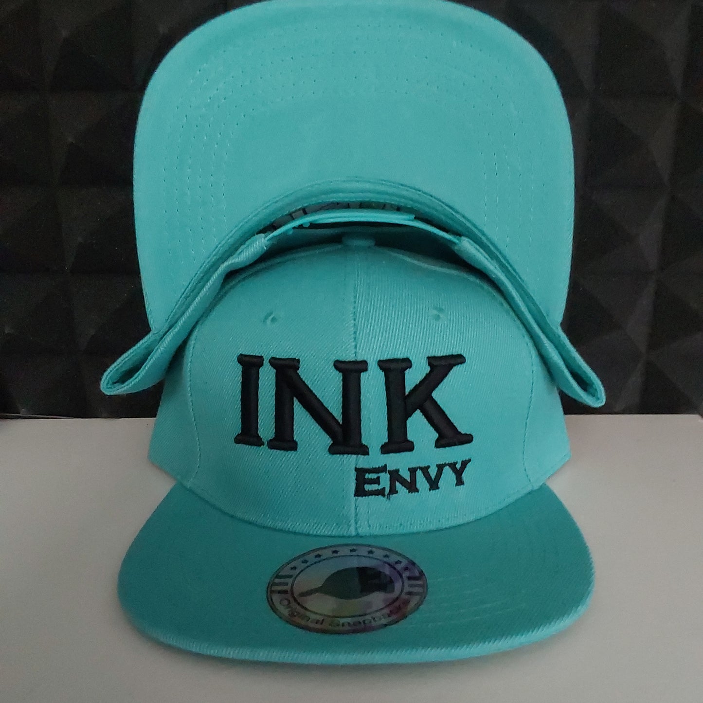 Snapback Bold INK  Black on teal With Puff Lettering