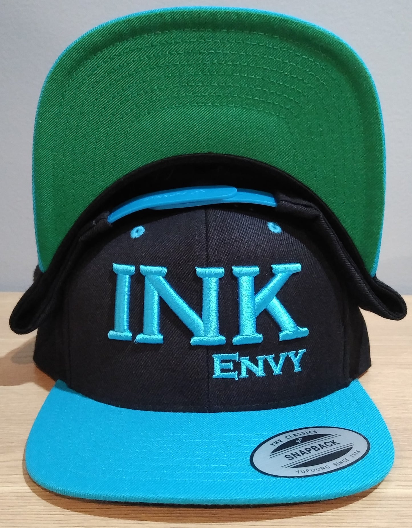 Snapback Bold INK Turquoise on Black With Puff Lettering